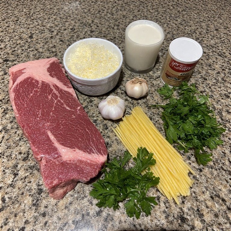 Ingredients for creamy beef fettuccine pasta